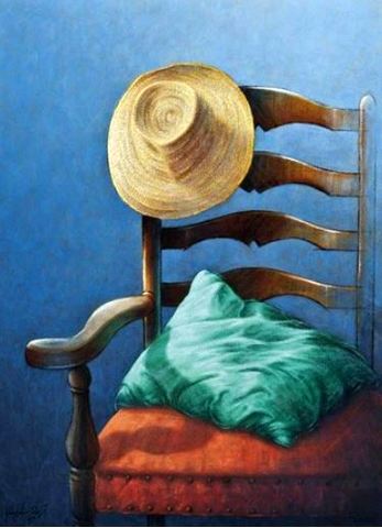 Straw Hat and a Cushion on a Chair