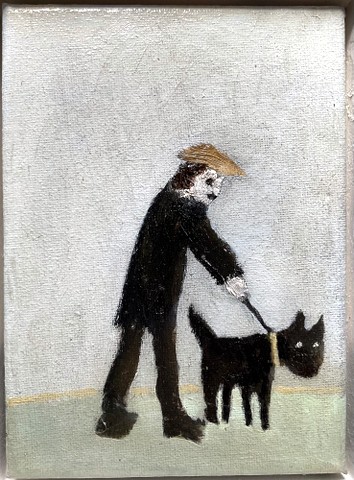 Man Walking a Dog