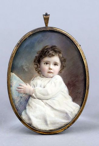 Toddler in a white dress with a children�s book